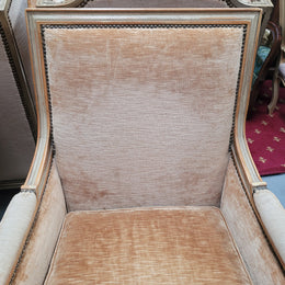 Pair of Louis XVI style painted arm chairs with carving & fluted legs. They have been sourced from France and the fabric is in good used original condition. Please view photos as they help form part of the description.