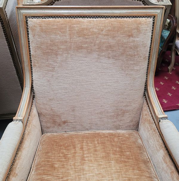 Pair of Louis XVI style painted arm chairs with carving & fluted legs. They have been sourced from France and the fabric is in good used original condition. Please view photos as they help form part of the description.