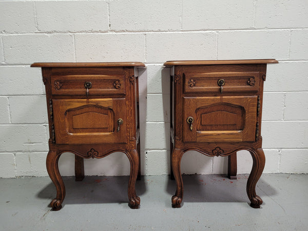 Pair of low Louis XV Style Oak bedsides with hard to find wooden tops. They are in good original detailed condition.