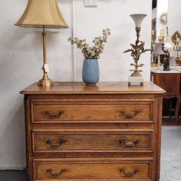 French solid Oak Louis 14th style chest of three drawers. It has three large spacious drawers and it has been sourced from France. It is in good original detailed condition.