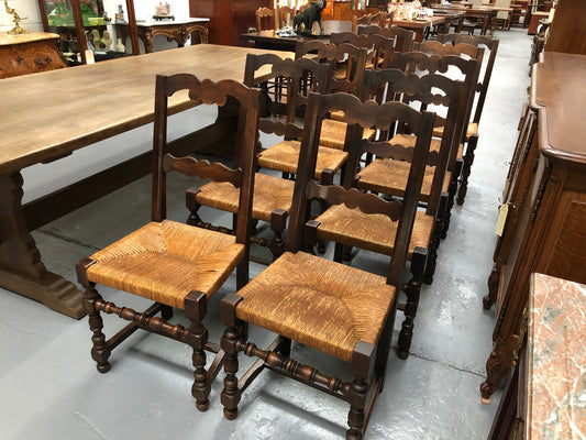 Set of 10 French Fruitwood rush seat dining chairs. They are in good original condition please view photos as they help form part of the description.
