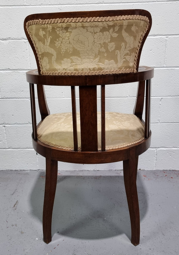 Charming Edwardian inlaid walnut upholstered armchair. In good original condition.