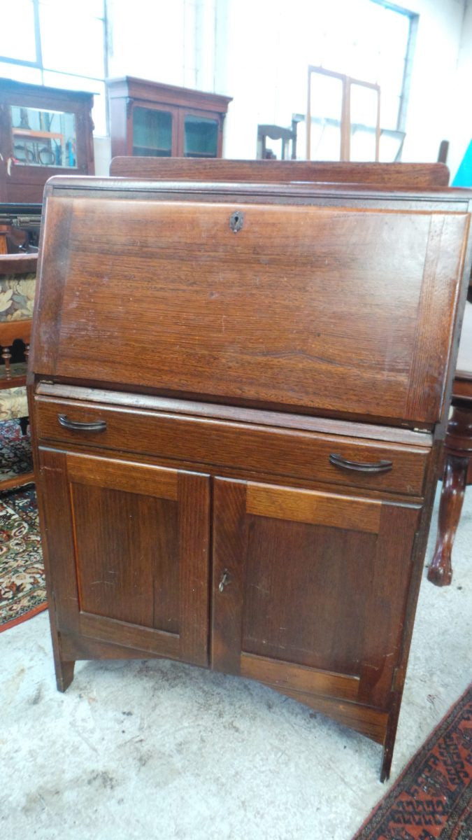 A Small Space Oak Secretaire