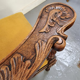 Beautifully carved French Walnut corner chair with upholstered seat. In good original detailed condition.