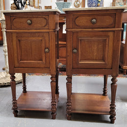 Antique French Oak Henry II white marble top bedside cabinets. They have one drawer and cupboard a long with an open shelf at the bottom. Sourced from France and in good original detailed condition.