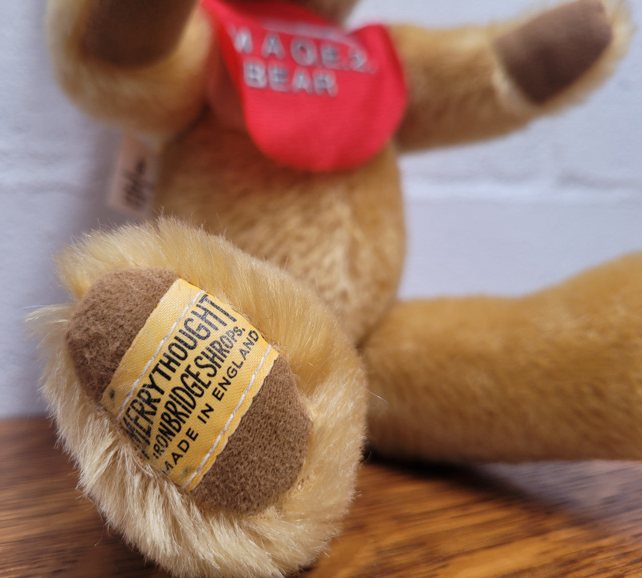 “Merry Thought” Golden Mohair fully Jointed Teddy Bear.  Made in England, commemorating QE2. 32cm length. Excellent Condition.