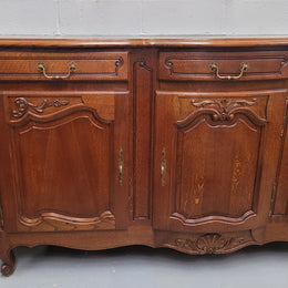 French Oak Louis XV style three drawer three door parquetry top sideboard. It has been sourced from France and is in good original detailed condition.