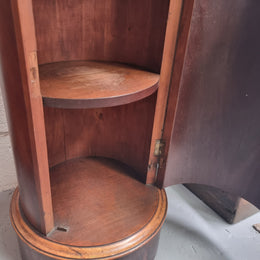 Unusual Empire flame Mahogany cylindrical marble topped bedside/pedestal. Would make an ideal pedestal with added storage inside or could be used as a bedside. Sourced from France and is in good original detailed condition.