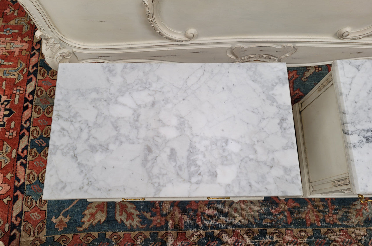 Attractive pair of Vintage French Louis 16th style two drawer marble topped bedsides. They have been sourced from France and are in good original condition.