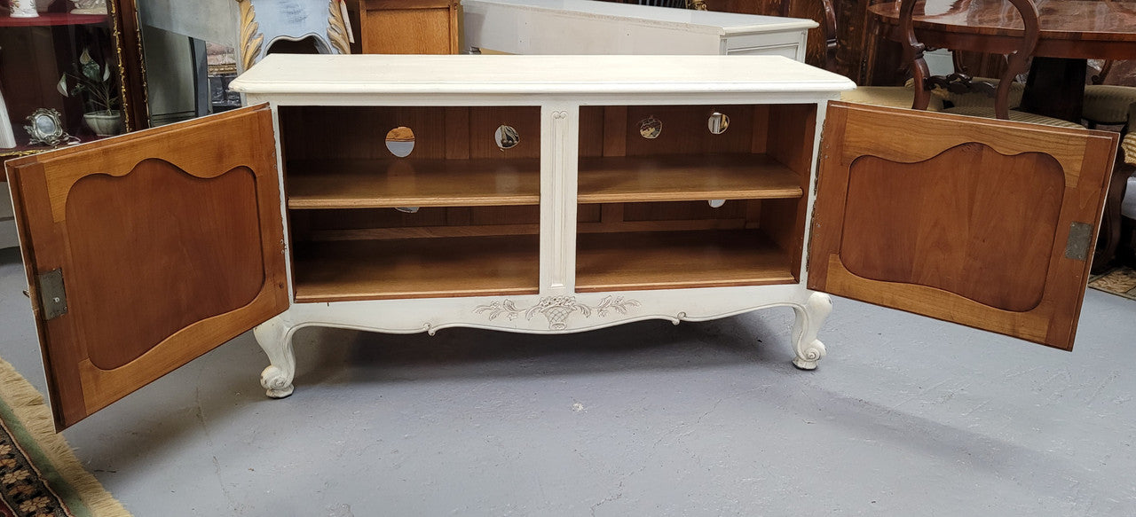 Louis XV style chalk painted two door cabinet which would also make an ideal TV cabinet. It has been sourced from France and in good original detailed condition.