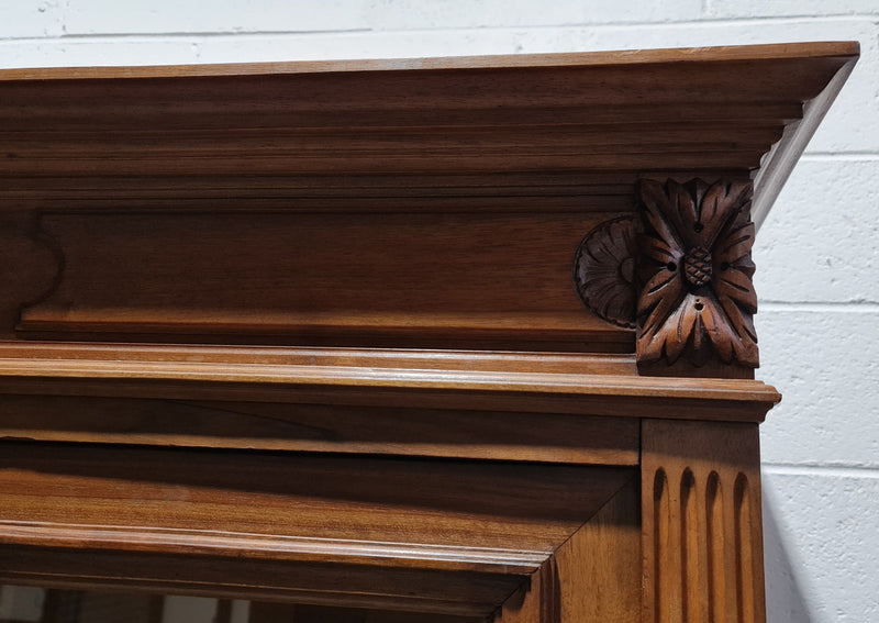 Stunning French Henry II style Walnut two door bookcase. In good original detailed condition.