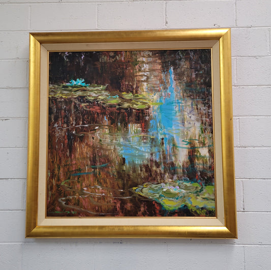 A beautiful Framed oil on canvas in vibrant colours and framed in a lovely gold frame. This piece is signed by artist John Cumming from "The Mill Gallery" and still has its original gallery card as shown in picture. It is in good original condition.