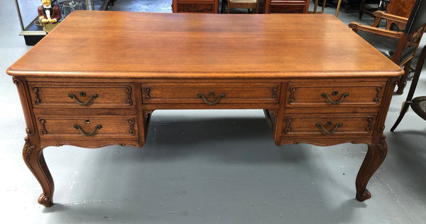 French Oak Louis XV style full partners desk with both sides having five functional drawers. In very good original detailed condition.