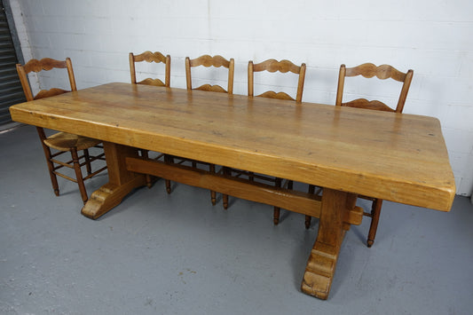 Amazing Rustic Oak French 10 seater refectory farmhouse table. This table can very comfortably seat 10 people and 12 if needed. The top has a charming natural rustic feel and it is in very good original detailed condition.