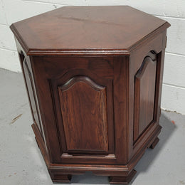 Hexagonal Mahogany enclosed side cabinet with two doors. Would make an ideal side cabinet and is in good restored condition.