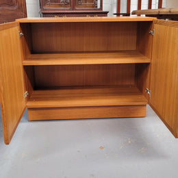 Lovely Vintage Teak two door cabinet ideal for a television cabinet in good original condition.