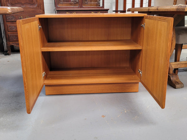 Lovely Vintage Teak two door cabinet ideal for a television cabinet in good original condition.