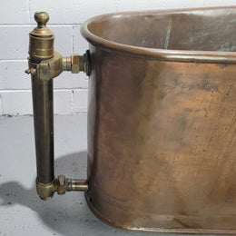 Sourced from France a rare full copper Antique bath tub on feet and includes an overflow, fittings, taps ect. In good original condition.