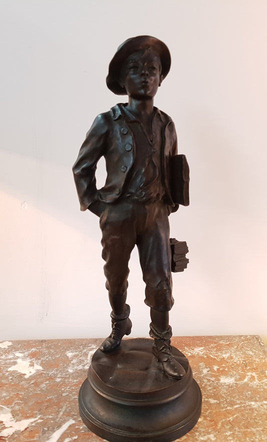 Fabulous French bronze statue of a school boy from the early 20th century. Signed by Marcel Debut ( 1865-1933) and its titled School Boy.