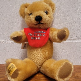 “Merry Thought” Golden Mohair fully Jointed Teddy Bear.  Made in England, commemorating QE2. 32cm length. Excellent Condition.