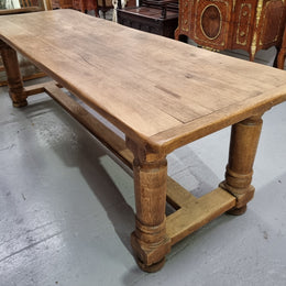 French Oak stretcher base farmhouse table with solid turned legs. It is in good original condition.