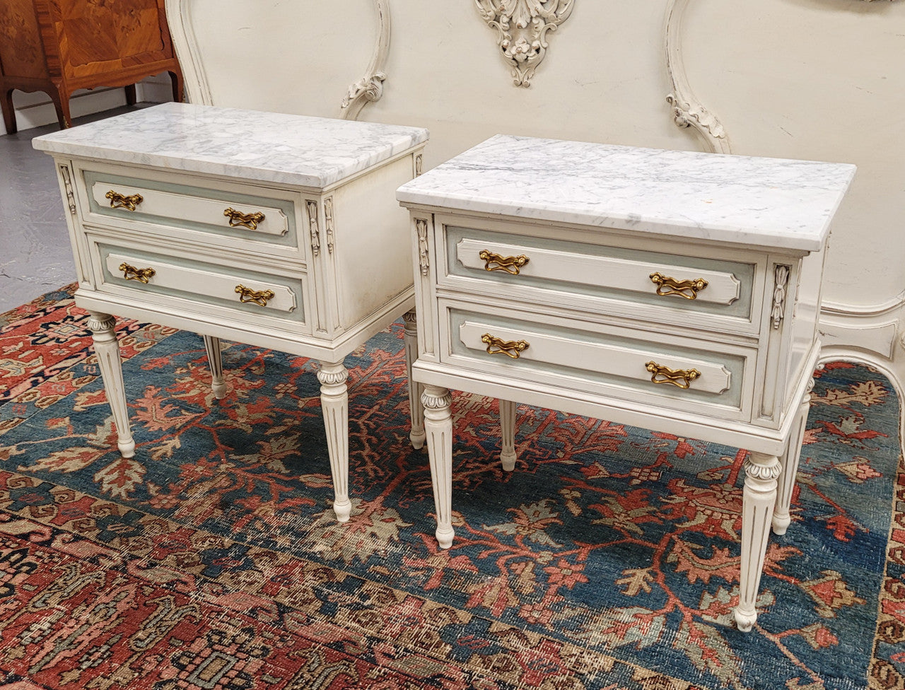 Attractive pair of Vintage French Louis 16th style two drawer marble topped bedsides. They have been sourced from France and are in good original condition.