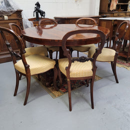 William IV Rosewood tilt top round table with six Rosewood chairs. It has been sourced from locally and is in good original detailed condition.