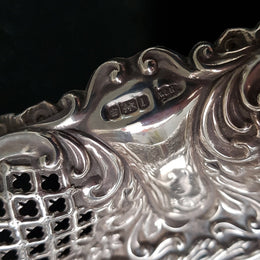 A Sheffield sterling silver bowl with repousse pattern, hallmarked WALKER & HALL and in good original condition.