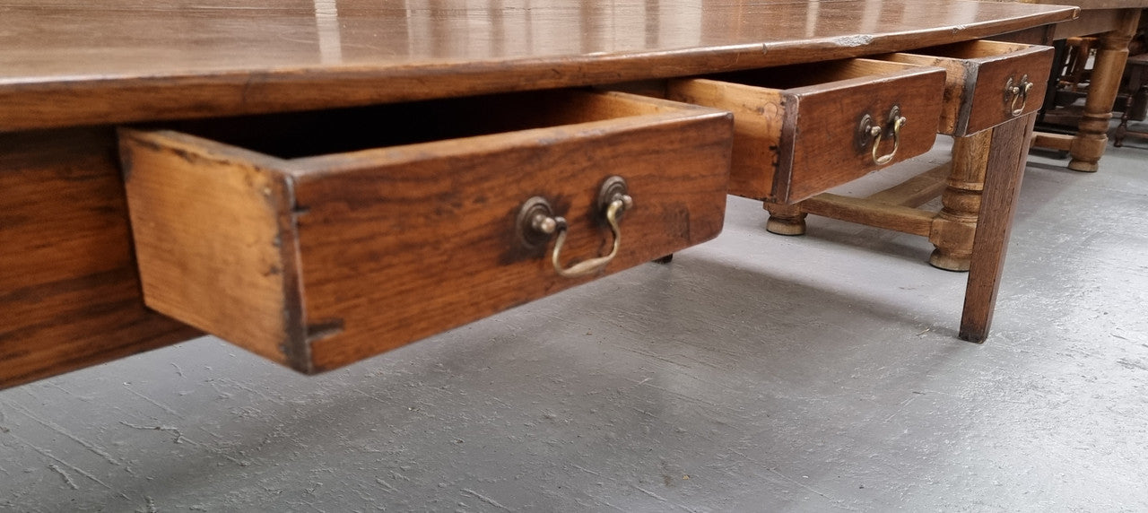 Amazing 19th Century French Oak Farmhouse style dining table with three drawers. It is made from three large planks of wood which is very hard to find. It is also very wide with a width of 105.5 cm. It is in good original detailed condition.