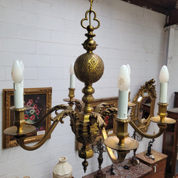 Stunning six arm French bronze chandelier. It can be used with or without shades. It has been fully rewired to Australian standards. It is in good original detailed condition.