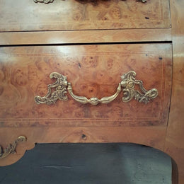 A large French Louis XV style Burr Walnut commode with a beautiful marble top. Has beautiful detailed mounts and plenty of storage space with two large drawers. From circa 1920 and in very good original condition.
