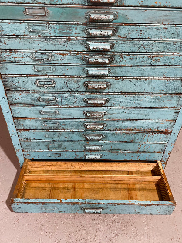 Fabulous set of vintage painted blue printers drawers that have adjustable separators which can be taken out for large papers. The drawers are various sizes and there is a section on top for working on or for storing brushes or tall items . These would be perfect for artists or jewellery pieces or even architects. Such a beautiful piece of industrial furniture.