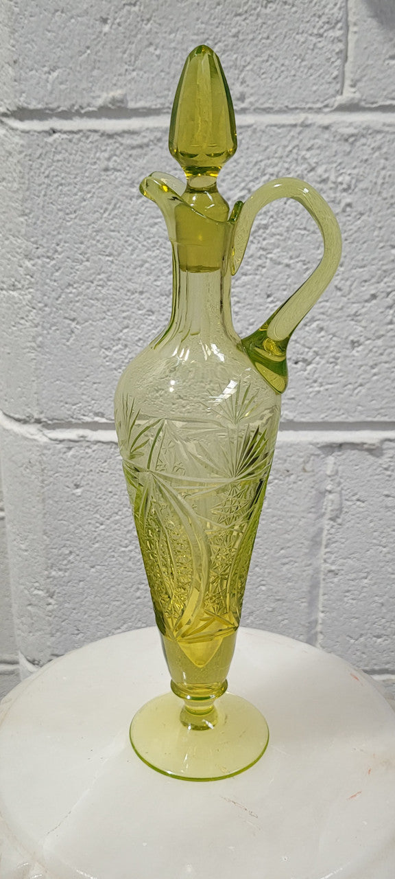 Stunning Uranium glass decanter and stopper. Great shape and height of 30.5cm