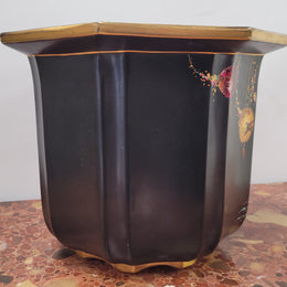 Stunning antique Jardiniere with a black background and colourful oriental scene with gold trim. It is in good orginal condition It is in good original condition pleae view photos has they help form part of the description. Stamped "Olympic English Make"