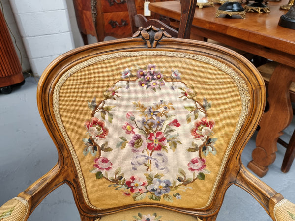 Louis XV style Walnut and tapestry armchair. Very comfortable to sit in and tapestry is in good original used condition.