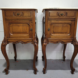 Pair of Louis XV style bedside cabinets with beautiful marble tops and one drawer and single cupboard for all your storage needs. In good original detailed condition.