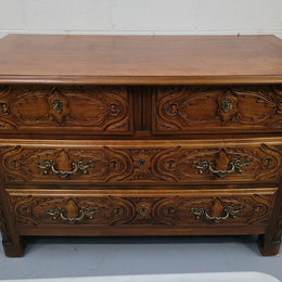 French Cherrywood Louis XIV style wooden topped chest of four drawers. It has been sourced from France and is in good original detailed condition.