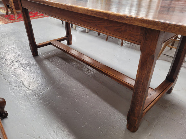 French oak stretcher base refectory table. It has been sourced from France and is in good original condition. Please see pictures to form part of the description.
