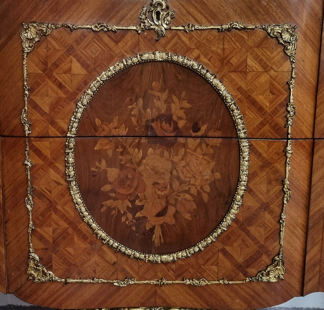 Stunning Louis XV style ormolu and marquetry marble top commode with two drawers. It has an amazing thick marble top and it is in good original detailed condition.