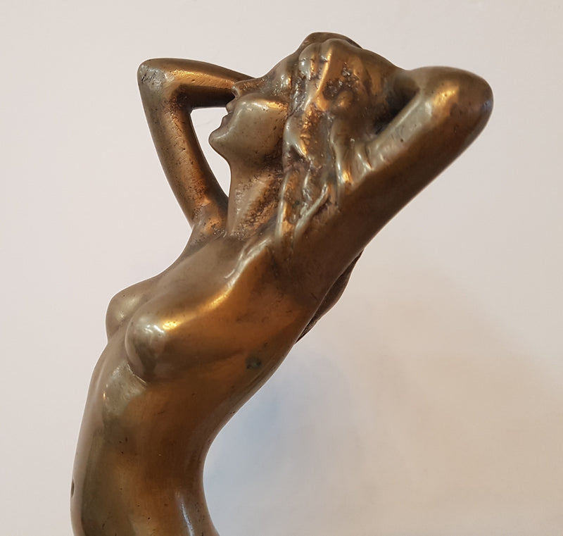 Here we have a lovely circa 1930's solid Art Deco bronze statue of a female on a wooden base. In good original condition.