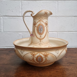Charming large Crown Devon jug and basin set. Muted colors featuring garlands and floral medallions “Festoon Pattern” No chips or cracks in good condition commensurate with age