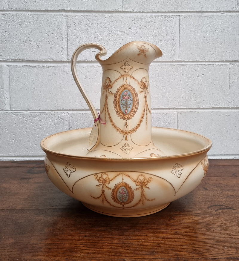 Charming large Crown Devon jug and basin set. Muted colors featuring garlands and floral medallions “Festoon Pattern” No chips or cracks in good condition commensurate with age