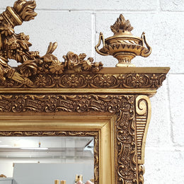 A stunning French 19th century gilded wall mirror in good original condition.