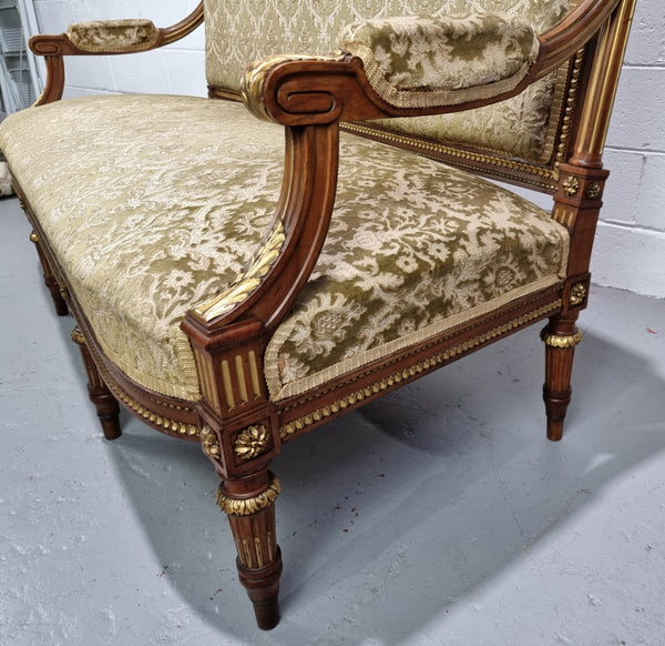 Beautiful French walnut Louis XVI style upholstered three piece Salon Suite. It has lovely fabric which is in overall good condition and is very comfortable to sit in. In good original detailed condition.
