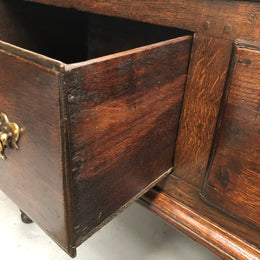 Early 19th Century English Oak dresser base with three large drawers. In very good original detailed condition.