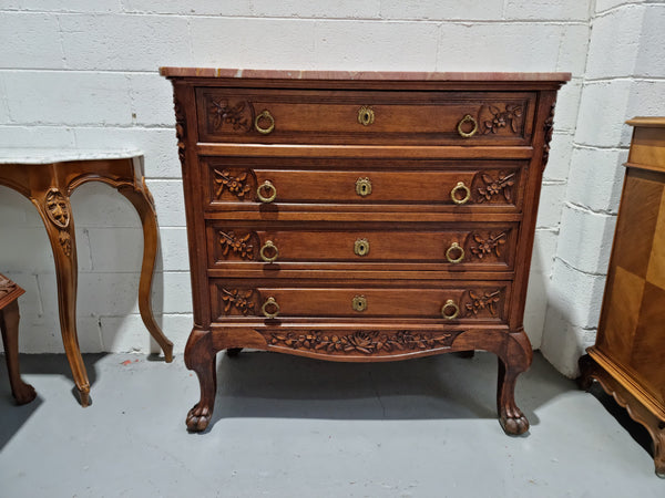 Lovely Antique French Walnut Renaissance style chest of four drawers with decorative handles and beautifully carved. There is a lovely marble top and in good original detailed condition.