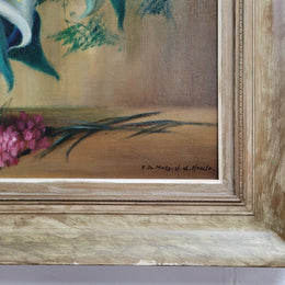 Signed and sourced in France a vintage oil on board still life of white lillie's in vase. In a beauitufl frame and it is in good original detailed condition.