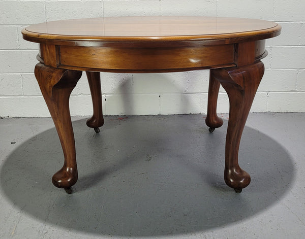 Period blackwood two leaf extension table. It can comfortably sit six people and eight when extend. It is in good original detailed condition.