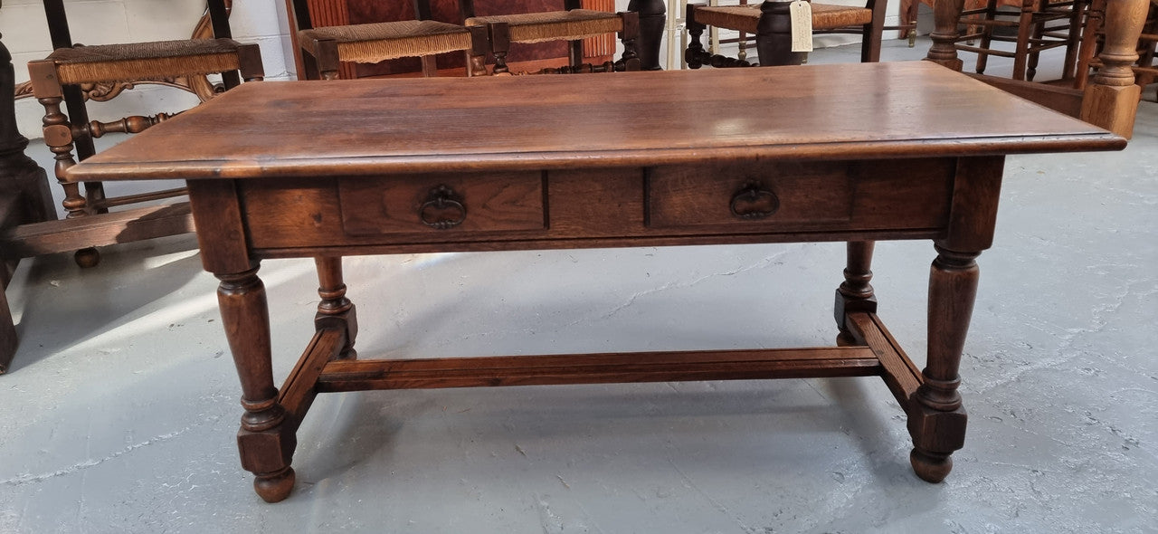 Beautiful French oak 2 drawer coffee table. In good original detailed condition.