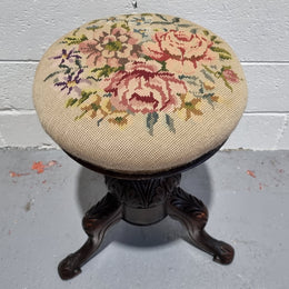 Beautiful Late Victorian Floral tapestry covered revolving piano stool. It is in very good original detailed condition. It has a original David Jones label underneath .